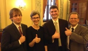From left, Scott Nystrom, Jessica Landerman, Danny Richter and Peter Fiekowsky are all smiles after the Senate REMI briefing.