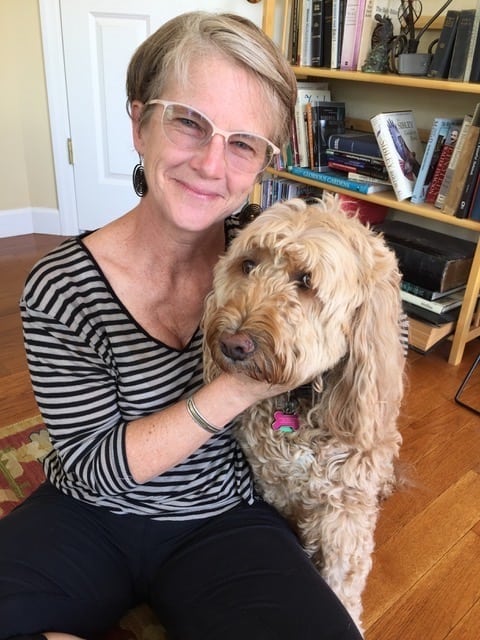 Dr. Steva Stowell-Hardcastle, veterinarian, with her dog Scarlet Alice