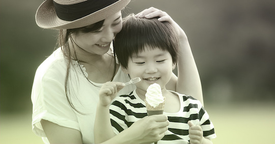 Mom and child eating an ice cream cone