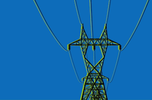 A transmission tower holds electric power lines. The background is blue.
