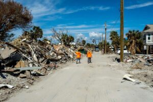 The destruction of buildings as a cause of hurricanes and climate change