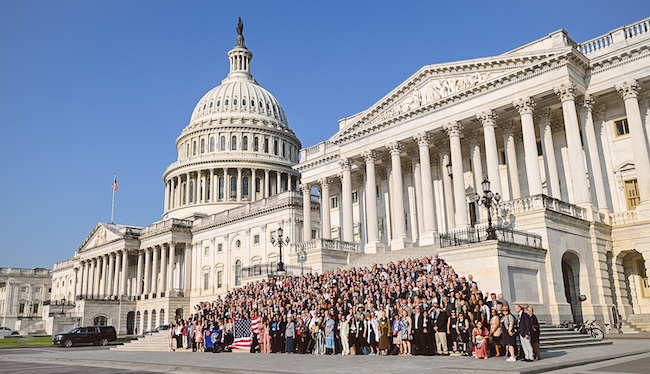 Hundreds of CCL volunteers pose for a group photo on the steps of Capitol Hill
